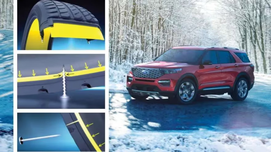 Ford Explorer SUV in red, driving through snowy forest with cross-section images of advanced tire technology and winter traction